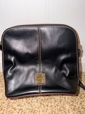 Dooney & Bourke Black Leather Crossbody with Cream Stitching and Gold Plaque